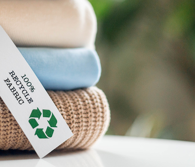 Recycled fabric clothes with eco friendly label.